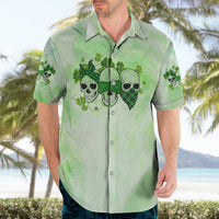 Green Hawaiian shirt on adult, front view with skull and clover print, short sleeves