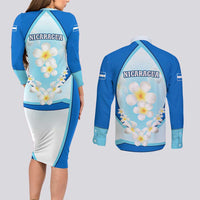 Nicaragua National Emblem Couples Matching Long Sleeve Bodycon Dress and Long Sleeve Button Shirt with White Flor de Sacuanjoche and Blue Gradient Design - Wonder Print Shop