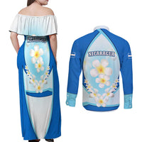 Nicaragua National Emblem Couples Matching Off Shoulder Maxi Dress and Long Sleeve Button Shirt with White Flor de Sacuanjoche and Blue Gradient Design - Wonder Print Shop