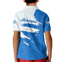 Nicaragua Flag Ripped Effect Kid Polo Shirt with National Emblem and Floral Pattern Design - Wonder Print Shop