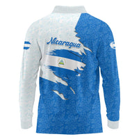 Nicaragua Flag Ripped Effect Long Sleeve Polo Shirt with National Emblem and Floral Pattern Design - Wonder Print Shop