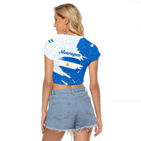 Nicaragua Flag Ripped Effect Raglan Cropped T Shirt with National Emblem and Floral Pattern Design - Wonder Print Shop