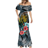 Women’s off-shoulder mermaid maxi dress with central turtle medallion and teal floral print