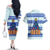 Uruguay Christmas Couples Matching Off The Shoulder Long Sleeve Dress and Hawaiian Shirt with Capybaras Holiday Tree Sun Emblem and Blue Festive Pattern - Wonder Print Shop