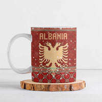 Albania Christmas Ceramic Mug with Red Geometric Design, Golden Double-Headed Eagle, and Santa Motif - Wonder Print Shop