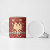 Albania Christmas Ceramic Mug with Red Geometric Design, Golden Double-Headed Eagle, and Santa Motif - Wonder Print Shop