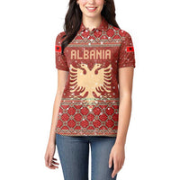 Albania Christmas Women Polo Shirt with Red Geometric Design, Golden Double-Headed Eagle, and Santa Motif - Wonder Print Shop