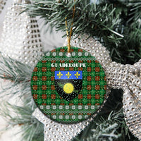 Guadeloupe Christmas Ceramic Ornament with Green-Red Plaid Design, Sun and Sugarcane Emblem, and Santa Sleigh Motif - Wonder Print Shop