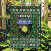 Guadeloupe Christmas Garden Flag with Green-Red Plaid Design, Sun and Sugarcane Emblem, and Santa Sleigh Motif - Wonder Print Shop