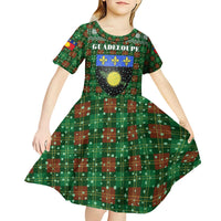 Guadeloupe Christmas Kid Short Sleeve Dress with Green-Red Plaid Design, Sun and Sugarcane Emblem, and Santa Sleigh Motif - Wonder Print Shop