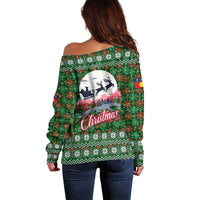 Guadeloupe Christmas Off Shoulder Sweater with Green-Red Plaid Design, Sun and Sugarcane Emblem, and Santa Sleigh Motif - Wonder Print Shop