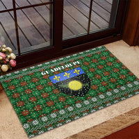 Guadeloupe Christmas Rubber Doormat with Green-Red Plaid Design, Sun and Sugarcane Emblem, and Santa Sleigh Motif - Wonder Print Shop