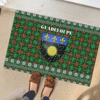 Guadeloupe Christmas Rubber Doormat with Green-Red Plaid Design, Sun and Sugarcane Emblem, and Santa Sleigh Motif - Wonder Print Shop