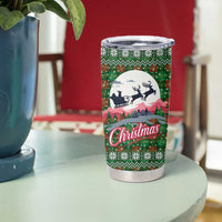 Guadeloupe Christmas Tumbler Cup with Green-Red Plaid Design, Sun and Sugarcane Emblem, and Santa Sleigh Motif - Wonder Print Shop
