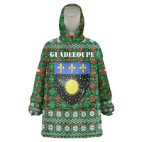 Guadeloupe Christmas Wearable Blanket Hoodie with Green-Red Plaid Design, Sun and Sugarcane Emblem, and Santa Sleigh Motif - Wonder Print Shop