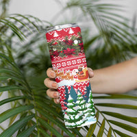 Guinea Bissau Christmas Skinny Tumbler with Santa Sleigh Reindeer Forest and National Flag Design - Wonder Print Shop