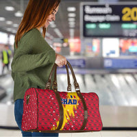 Chad Christmas Travel Bag with Red-Yellow Festive Pattern, National Coat of Arms, and Snowflake Accents - Wonder Print Shop