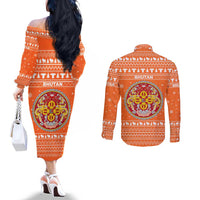 Bhutan Christmas Couples Matching Off The Shoulder Long Sleeve Dress and Long Sleeve Button Shirt with Takin Santa Hat Christmas Tree and Snowflake Pattern in Orange - Wonder Print Shop