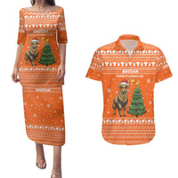 Bhutan Christmas Couples Matching Puletasi and Hawaiian Shirt with Takin Santa Hat Christmas Tree and Snowflake Pattern in Orange - Wonder Print Shop