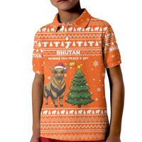 Bhutan Christmas Kid Polo Shirt with Takin Santa Hat Christmas Tree and Snowflake Pattern in Orange - Wonder Print Shop