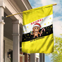 Brunei Christmas Garden Flag with Cartoon Monkey Santa Hat Candy Cane and Yellow Black Flag Pattern - Wonder Print Shop