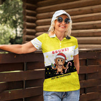 Brunei Christmas Women Polo Shirt with Cartoon Monkey Santa Hat Candy Cane and Yellow Black Flag Pattern - Wonder Print Shop