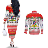 Namibia Christmas Couples Matching Off The Shoulder Long Sleeve Dress and Long Sleeve Button Shirt with Red-Green Theme, Coat of Arms, and National Flag Motif - Wonder Print Shop