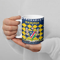 Namibia Christmas Ceramic Mug with Blue-Yellow Diamond Pattern, Coat of Arms, and Flag Map Motif - Wonder Print Shop