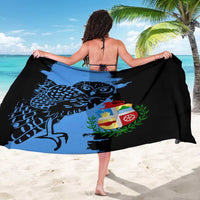 Aruba's Mascot Sarong Blended with National Flag Details – Symbolic Design