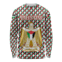 Palestine Christmas Long Sleeve Shirt with Red-Green Pattern, Golden Eagle Emblem, and Jesus Holding Flag Motif - Wonder Print Shop