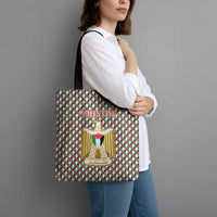 Palestine Christmas Tote Bag with Red-Green Pattern, Golden Eagle Emblem, and Jesus Holding Flag Motif - Wonder Print Shop
