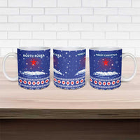 North Korea Christmas Ceramic Mug with Blue Pattern, Red Star, and Snowy Mountain Motif - Wonder Print Shop