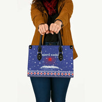North Korea Christmas Leather Bag with Blue Pattern, Red Star, and Snowy Mountain Motif - Wonder Print Shop