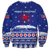 North Korea Christmas Sweatshirt with Blue Pattern, Red Star, and Snowy Mountain Motif - Wonder Print Shop