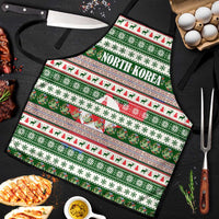North Korea Christmas Apron with Green-Red Design, National Emblem, and Festive Snowflake Motif - Wonder Print Shop