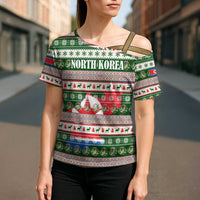North Korea Christmas Cross Shoulder Shirt with Green-Red Design, National Emblem, and Festive Snowflake Motif - Wonder Print Shop