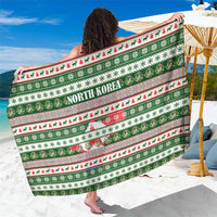North Korea Christmas Sarong with Green-Red Design, National Emblem, and Festive Snowflake Motif - Wonder Print Shop