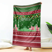 Oman Christmas Blanket with Green-Red Pattern, Mosque and Fort Landmarks, and Festive Ornament Motif - Wonder Print Shop