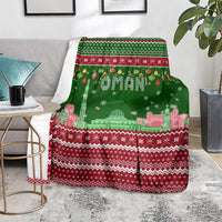 Oman Christmas Blanket with Green-Red Pattern, Mosque and Fort Landmarks, and Festive Ornament Motif - Wonder Print Shop