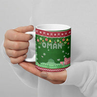 Oman Christmas Ceramic Mug with Green-Red Pattern, Mosque and Fort Landmarks, and Festive Ornament Motif - Wonder Print Shop