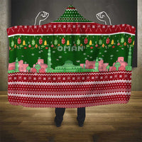 Oman Christmas Hooded Blanket with Green-Red Pattern, Mosque and Fort Landmarks, and Festive Ornament Motif - Wonder Print Shop