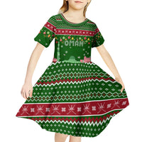 Oman Christmas Kid Short Sleeve Dress with Green-Red Pattern, Mosque and Fort Landmarks, and Festive Ornament Motif - Wonder Print Shop