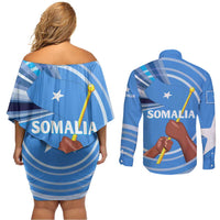 Somalia Couples Matching Off Shoulder Short Dress and Long Sleeve Button Shirt with Raised Fist Flag Blue Unity Wave Spirit