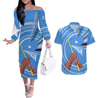 Somalia Couples Matching Off The Shoulder Long Sleeve Dress and Hawaiian Shirt with Raised Fist Flag Blue Unity Wave Spirit