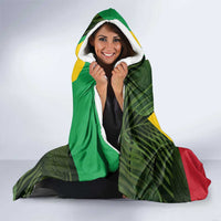 Saint Kitts and Nevis Apparel Hooded Blanket with Coat of Arms, Palm Trees, and Hammock Graphic in Tropical Green and Flag-Inspired Design - Wonder Print Shop