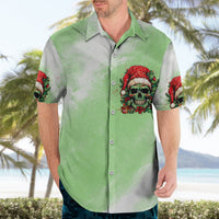 Green Hawaiian shirt with skull Santa graphic, button front, and red patterned cuffs