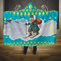 Kazakhstan Christmas Hooded Blanket with Santa Skiing in Traditional Outfit Snow Mountain and Sun Pattern - Wonder Print Shop