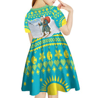 Kazakhstan Christmas Kid Short Sleeve Dress with Santa Skiing in Traditional Outfit Snow Mountain and Sun Pattern - Wonder Print Shop