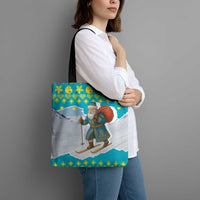 Kazakhstan Christmas Tote Bag with Santa Skiing in Traditional Outfit Snow Mountain and Sun Pattern - Wonder Print Shop