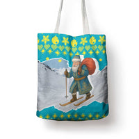 Kazakhstan Christmas Tote Bag with Santa Skiing in Traditional Outfit Snow Mountain and Sun Pattern - Wonder Print Shop